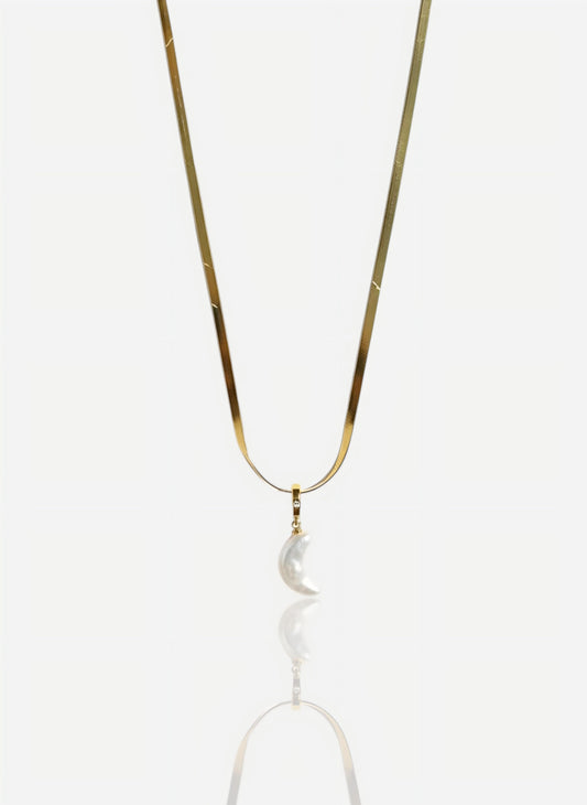 The pendant is on a wide, flat snake chain in heavy 18k gold vermeil over sterling silver, shot against a seamless white background.