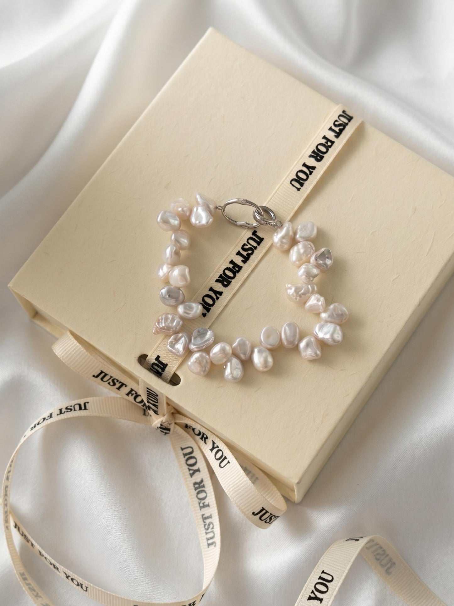 Pearltide organic Keshi pearl bracelet beautifully packaged in a branded gift box with ribbon, perfect quiet luxury gift for modern brides or bridesmaids.