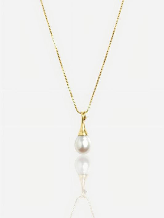 Close-up of Pearltide sleek teardrop pearl pendant with a modern tapered gold bail on a 14K gold-filled box chain, high-luster minimalist bridal jewelry.