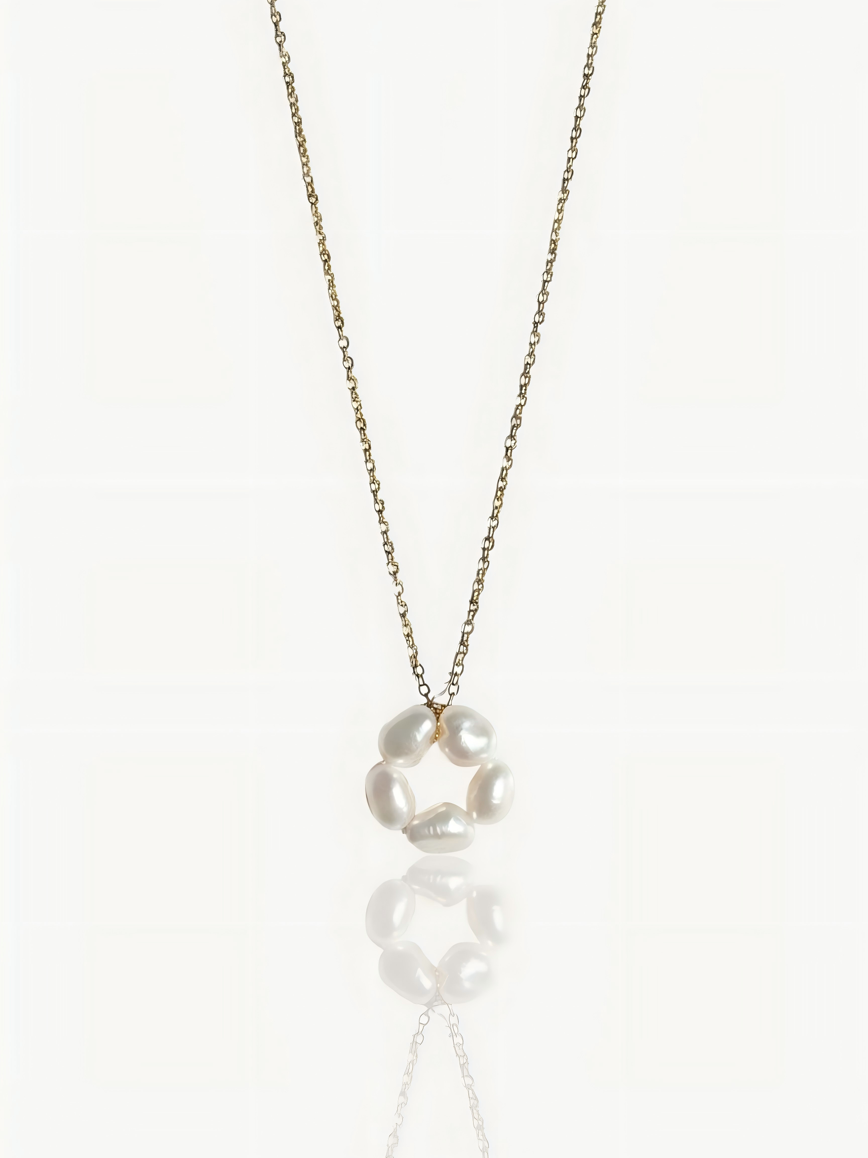 Close-up product shot of Pearltide’s minimalist petal baroque pearl pendant necklace, showcasing a high-luster sculptural pearl on a dainty 14K gold-filled chain against a clean white background. Elegant wedding and everyday statement jewelry.