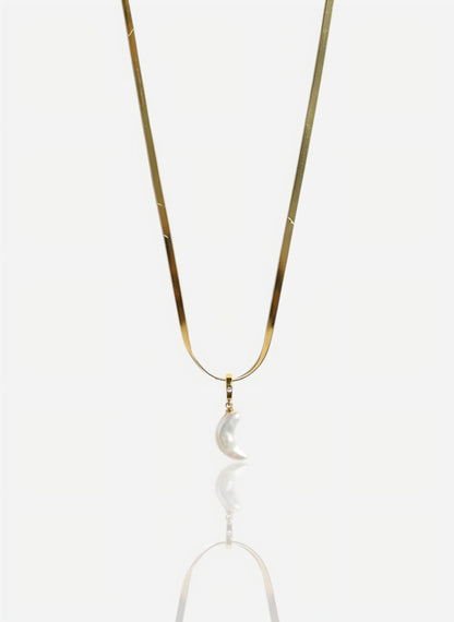 The pendant is on a wide, flat snake chain in heavy 18k gold vermeil over sterling silver, shot against a seamless white background.