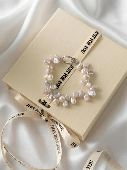 Pearltide organic Keshi pearl bracelet beautifully packaged in a branded gift box with ribbon, perfect quiet luxury gift for modern brides or bridesmaids.