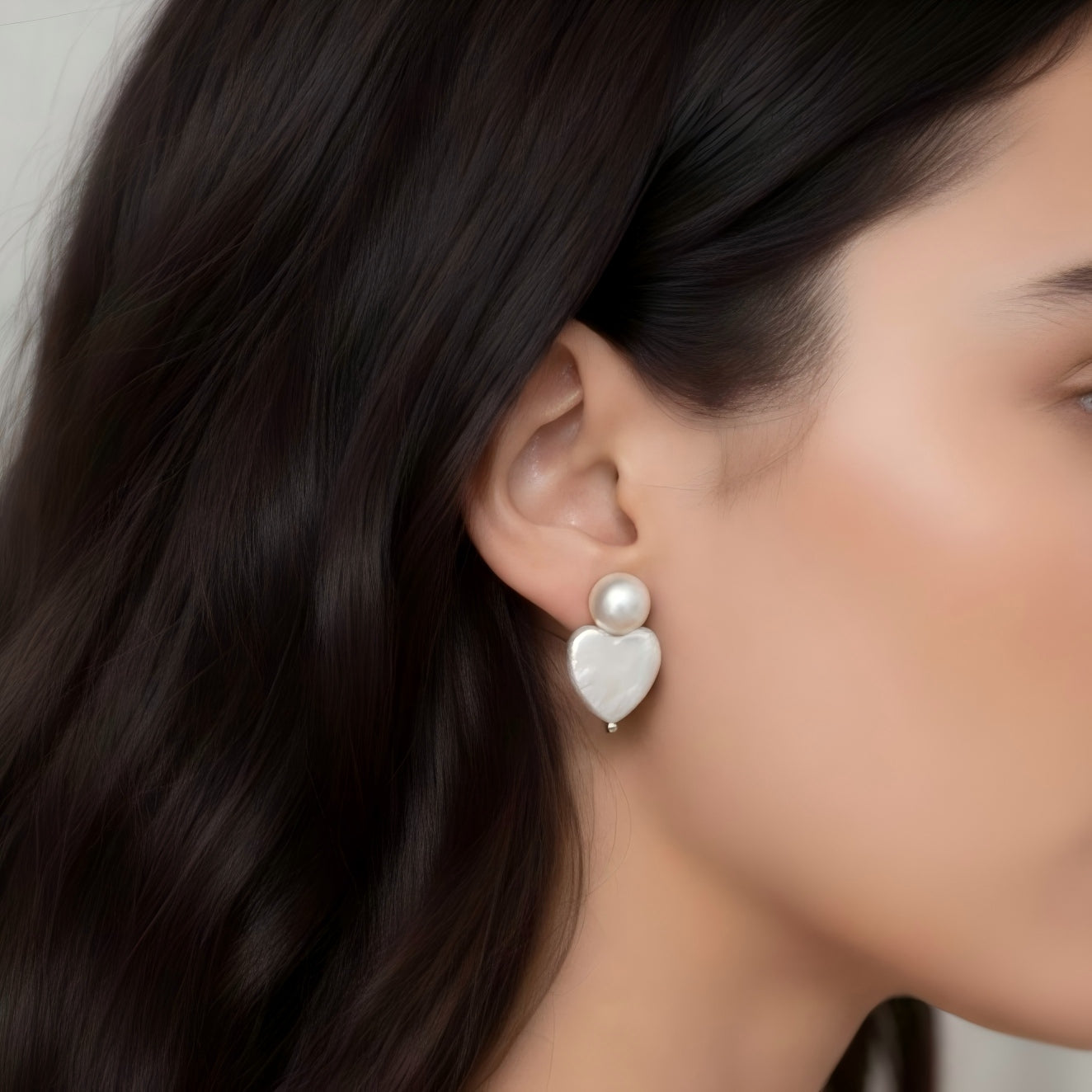 Subtle Sophistication. See how the heart-shaped silhouette beautifully frames the face, adding a romantic glow to your ensemble.