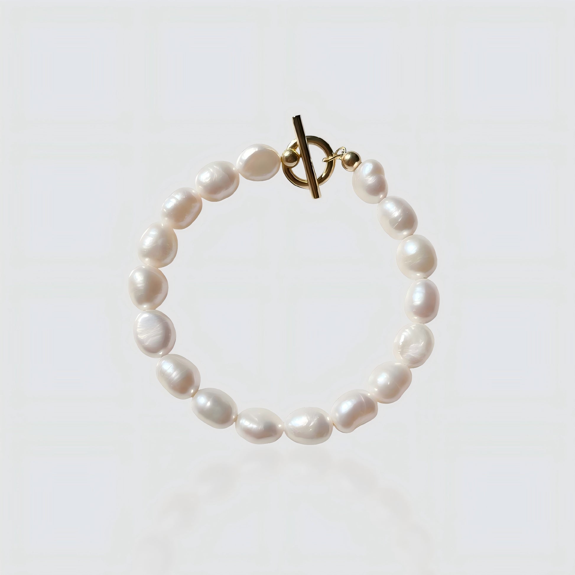 A clear view of our high-quality freshwater pearls and the durable gold T-bar clasp.