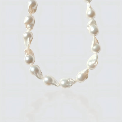 A clear view of the unique, organic shapes of each large baroque pearl. No two strands are exactly alike.