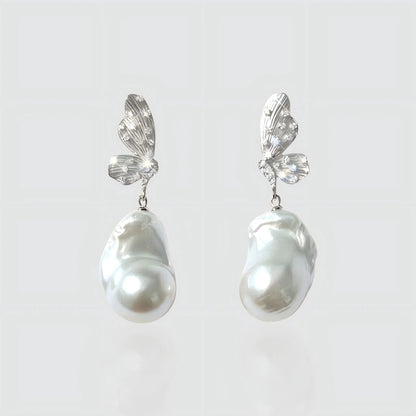 The Moonlit Monarch: Silver Butterfly Earrings with Large Baroque Pearls