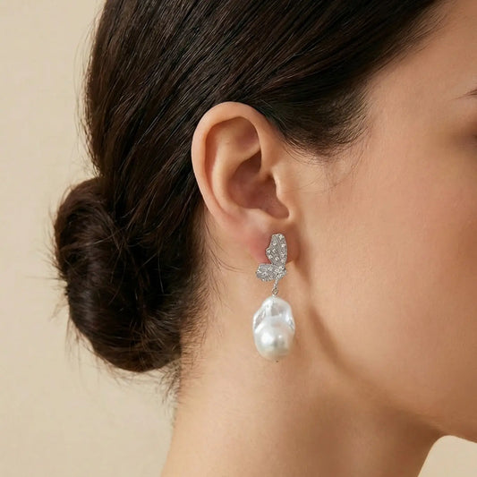 Bridal Elegance: Statement Butterfly Pearl Drops on Model