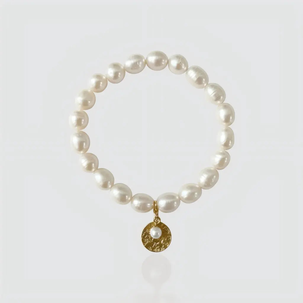 Vintage Treasure: Pearl Strand Bracelet with Textured Gold Coin Charm
