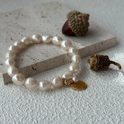 Hammered Detail: Gold Plated Medallion with Inset Pearl